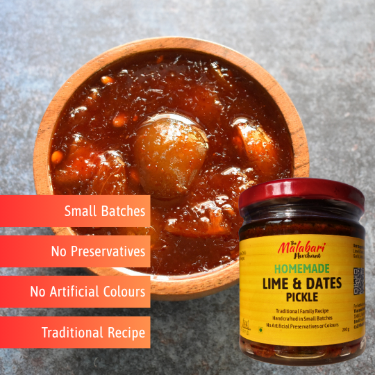 Jar of The Malabari Merchant Homemade Lime & Dates Pickle with a wooden bowl of pickles on a gray background